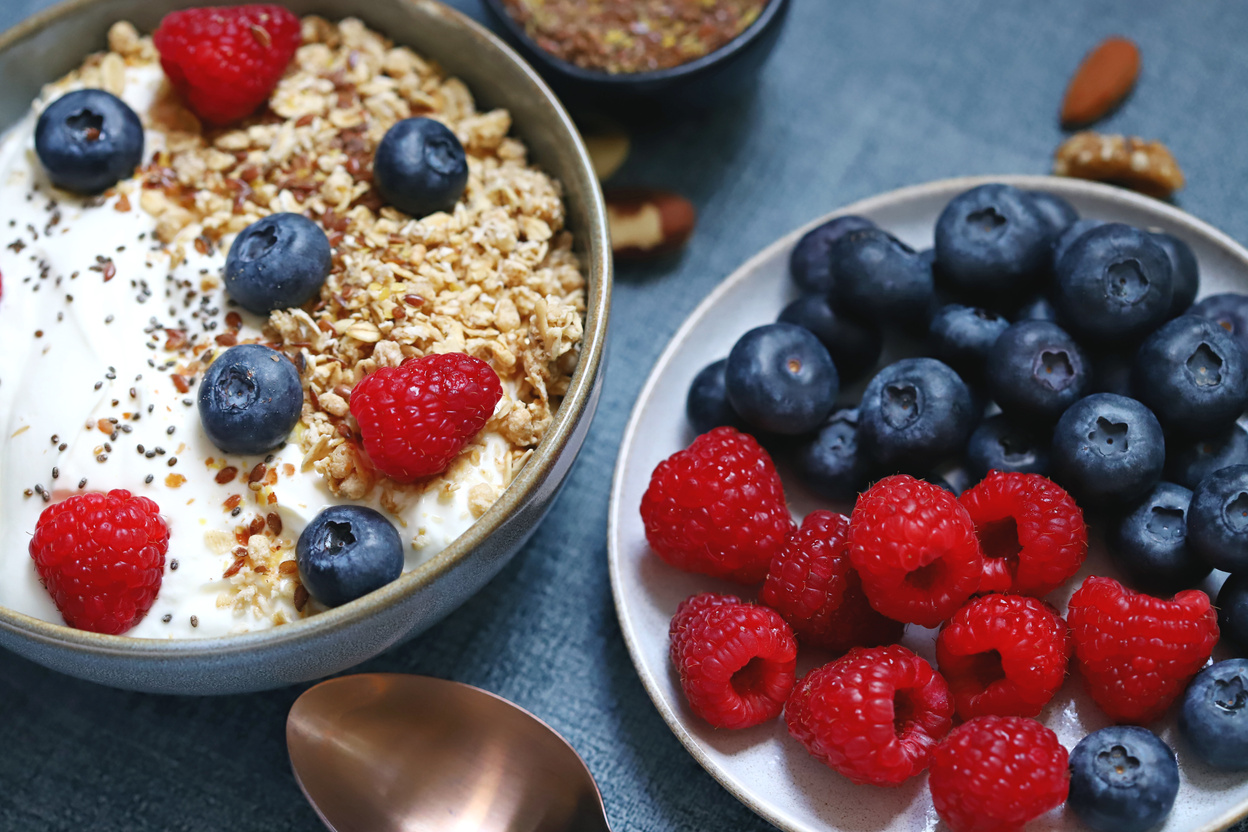 Breakfast bowl. Fresh homemade yogurt with seeds, nuts and berries. Keto diet.